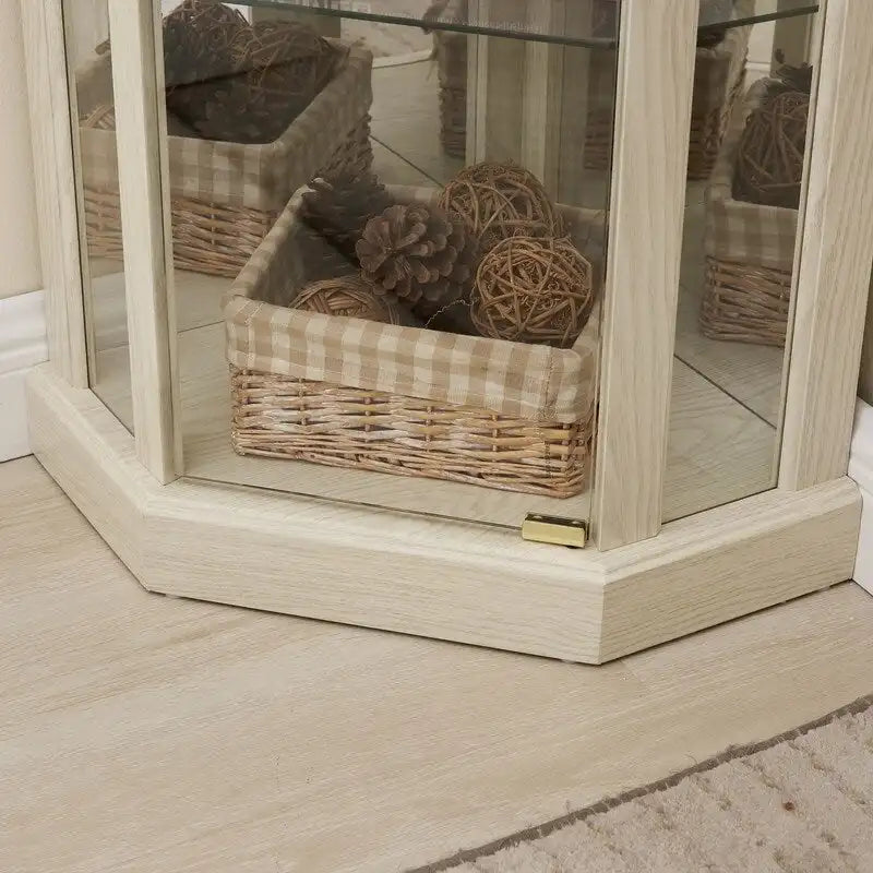 Vitrine en verre éclairée avec fond miroir et étagères réglables